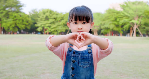 istock girl play in park 1442297952