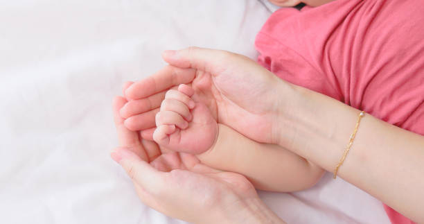 istock Mother and baby hands 1442298066