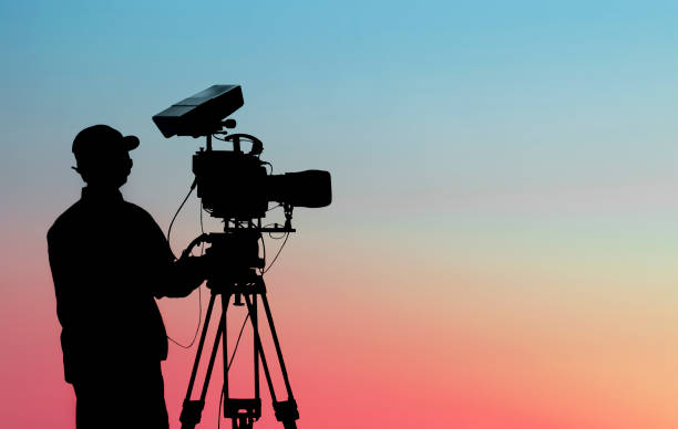 istock Cameraman Silhouette, Tv Camera 1442298092