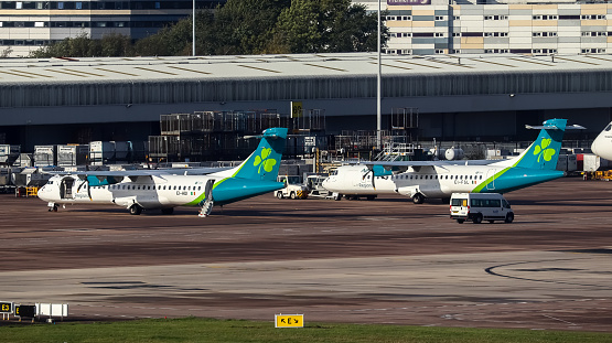 Manchester Airport, United Kingdom - 22 October, 2022: Aer Lingus ATR 72s (Various Reg) on remote stands.