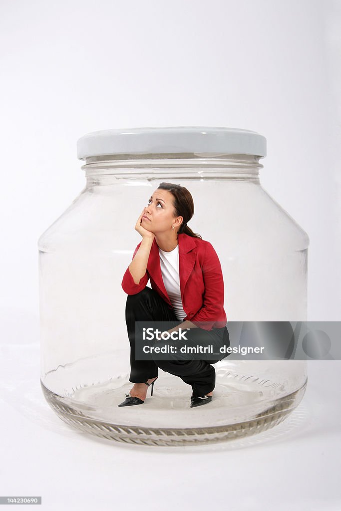 Femme d'affaires dans le pot - Photo de En verre libre de droits