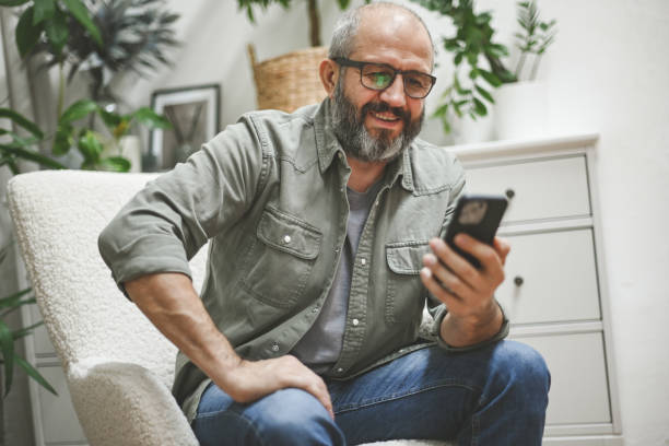 istock businessman working in the home office (laptop, mobile phone) 1442306946
