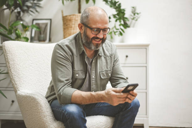 istock businessman working in the home office (laptop, mobile phone) 1442307084