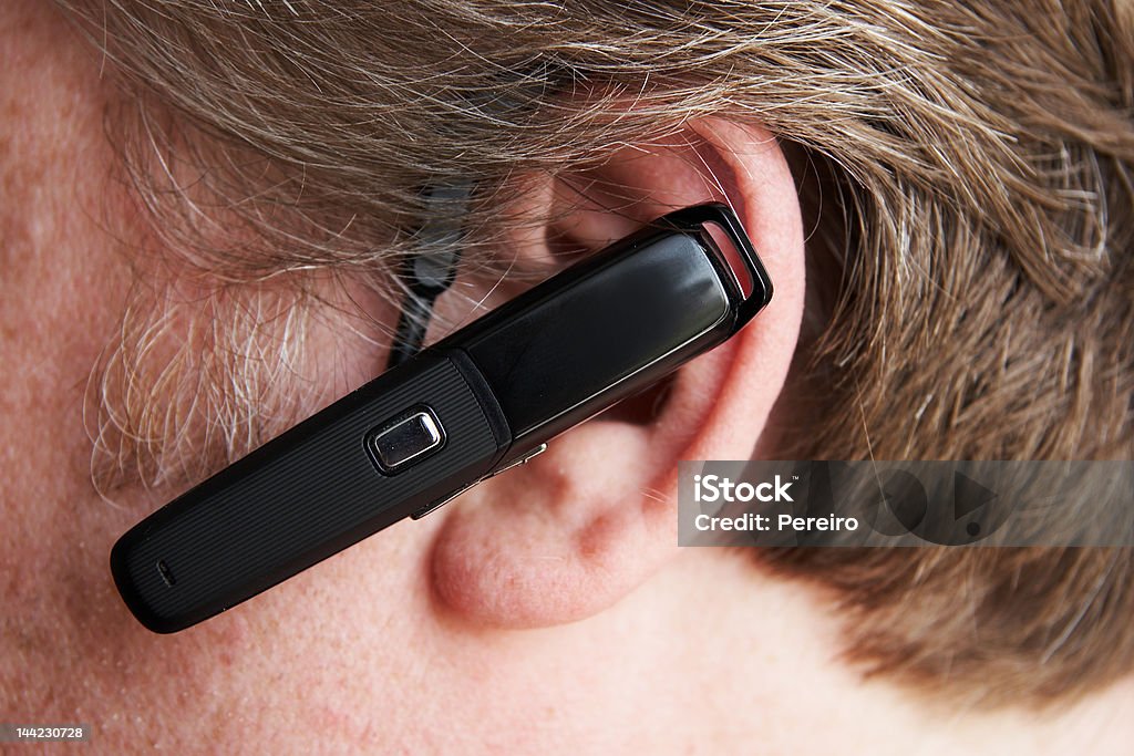 Homem com auricular bluetooth - Royalty-free Telefone com Função Mãos-Livres Foto de stock