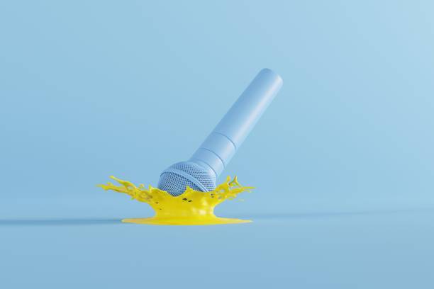 istock A microphone falling to the ground in a splash of water. 1442310408