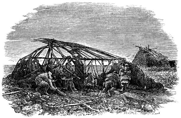 Chukchi people building a traditional Yaranga house on the Chukotka Peninsula, Russia. Vintage etching circa 19th century.
