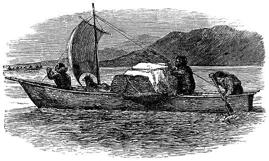 Chukchi people in a traditional Umiak boat on the Chukotka Peninsula, Russia. Vintage etching circa 19th century.