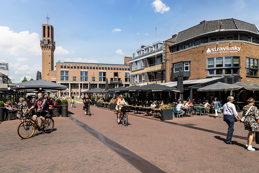 Hengelo, Netherlands, July 14, 2022; Cozy city center with the city hall of Hengelo in the background.