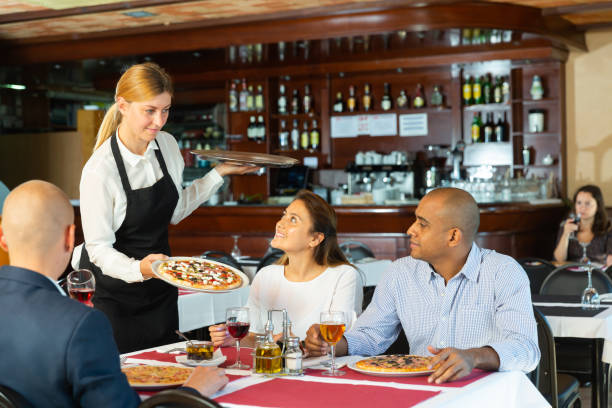 Friends eating italian food in restauarnt