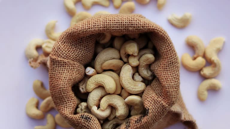 Burlap sack filled with cashew table top spin