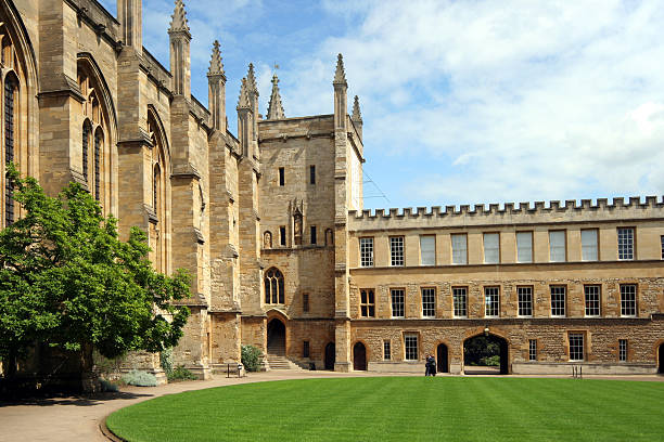 Oxford University College Courtyard Showing the neatly clipped lawn of New College, with the chapel to the left.  This is one of the best preserved ancient college buildings, dating from the 1400s. oxford university photos stock pictures, royalty-free photos & images