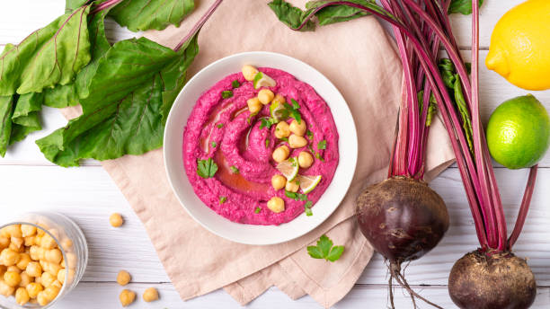 istock Homemade Beetroot hummus on white table, top view 1442320919