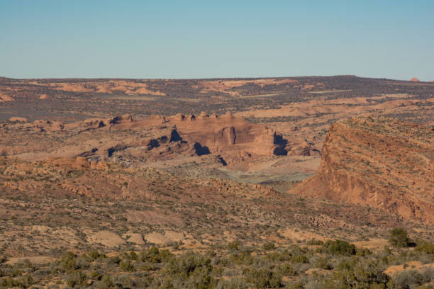 istock Red rock cliffs and spires in Arches National Park 1442324997