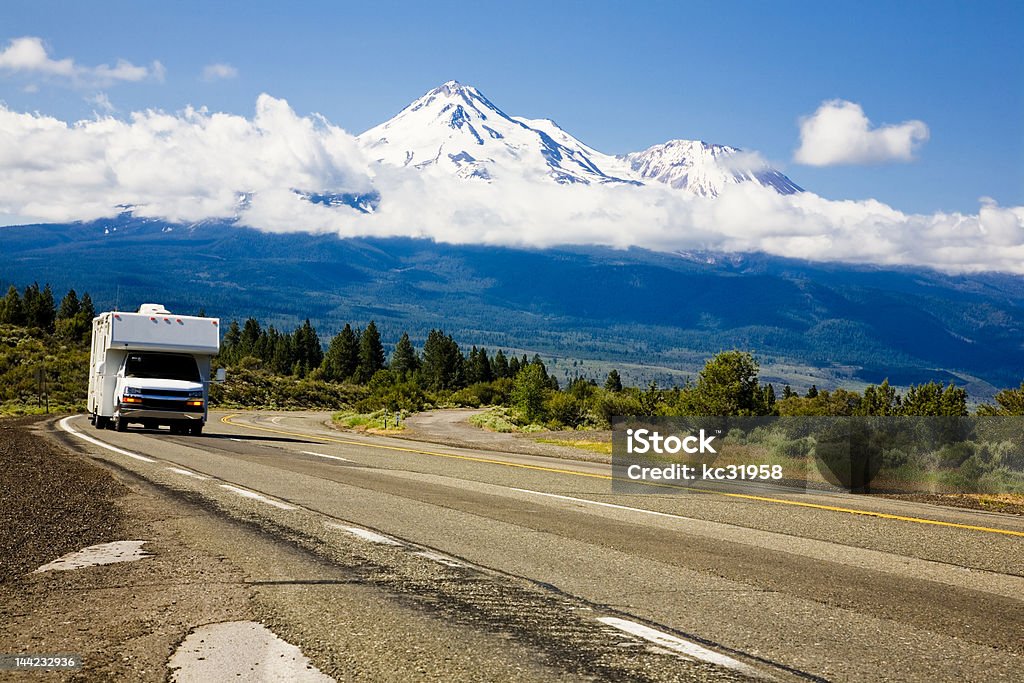 Travel America Motor home traveling past Mt. Shasta in Northern California.  Motor Home Stock Photo