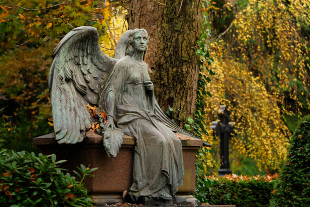 istock angel with spread wings on a cemetery 1442331175