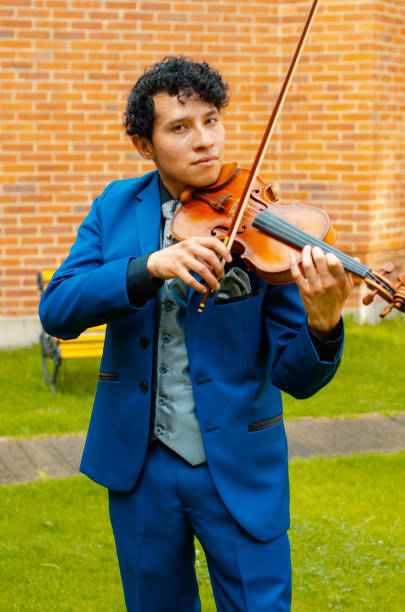 istock Man playing the violin outside 1442332117