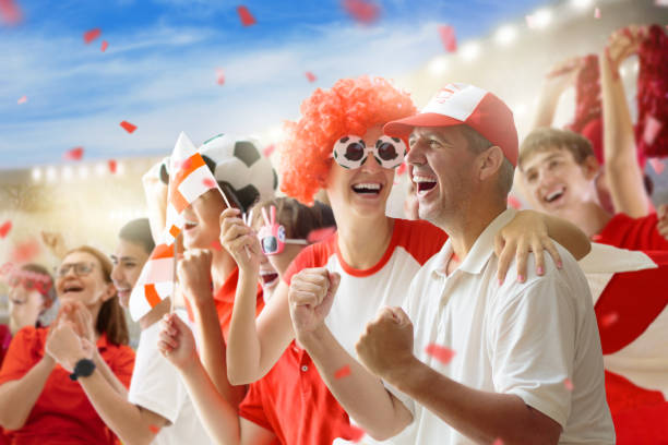 istock England football team supporter on stadium. 1442333682
