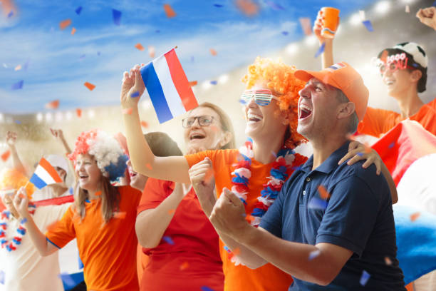Netherlands football team supporter on stadium.