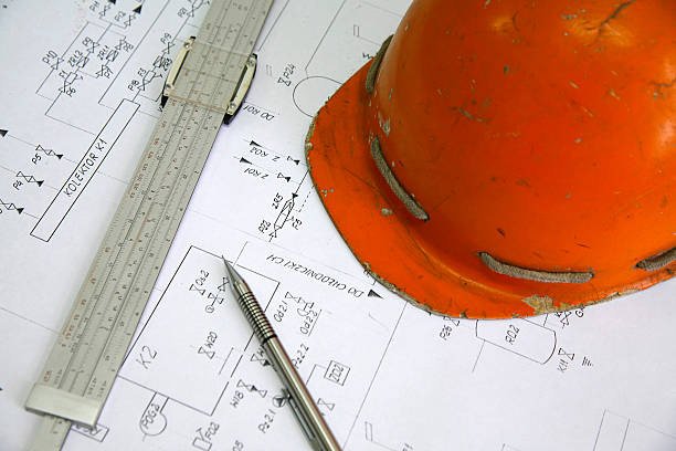 istock A builders tool kit containing a helmet, pencil and caliper 144234336