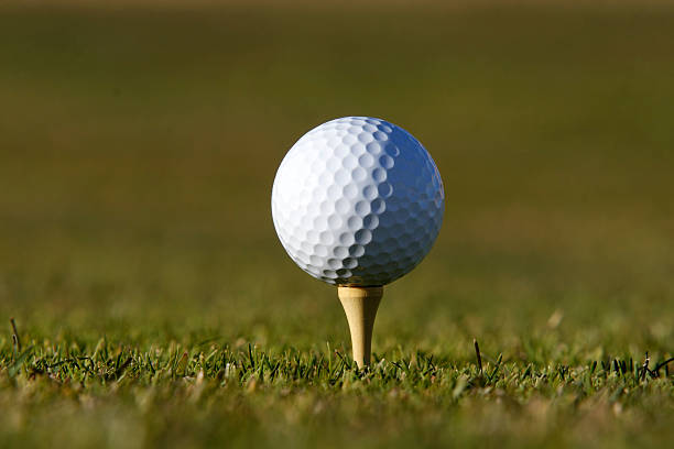 ゴルフボール - golf golf course swinging isolated ストックフォトと画像