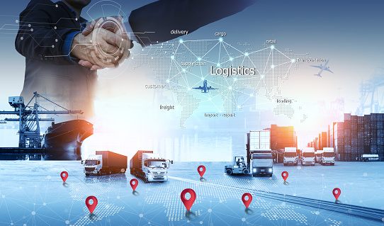 Logistic import export and transportation concept, Business people shaking hands, success business of Logistics Industrial Container Cargo freight ship for Concept of fast or instant shipping Online