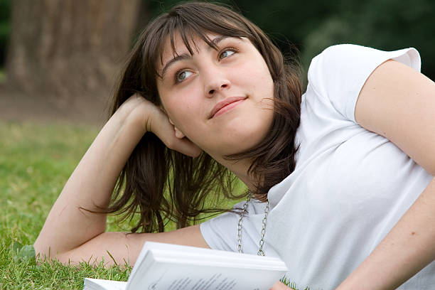 Girl's book dreams stock photo