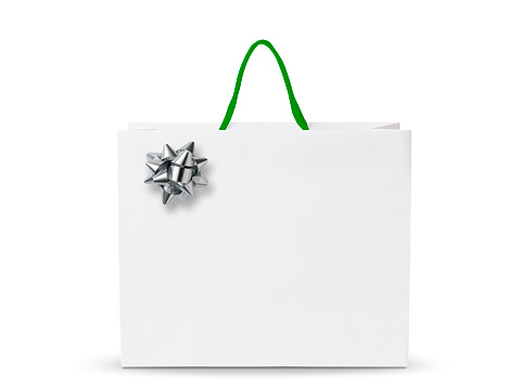 White shopping bag with silver bow, isolated on white with clipping path.