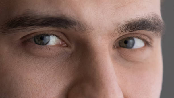 istock Cropped shot serious young man green eyes looking at camera 1442364891