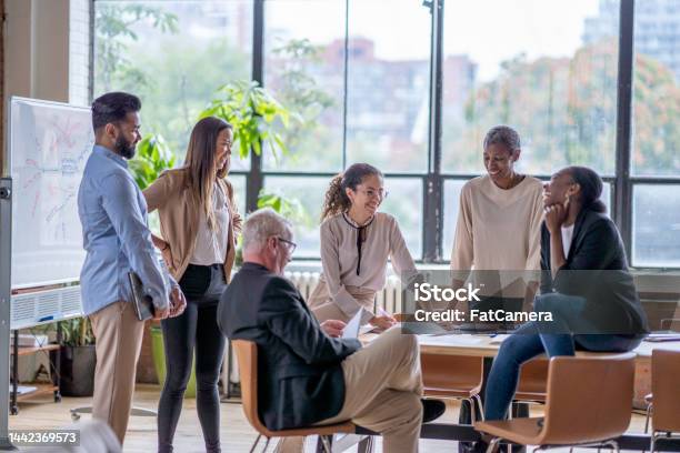 Casual Business Meeting Stock Photo - Download Image Now - Employee, Happiness, Multiracial Group