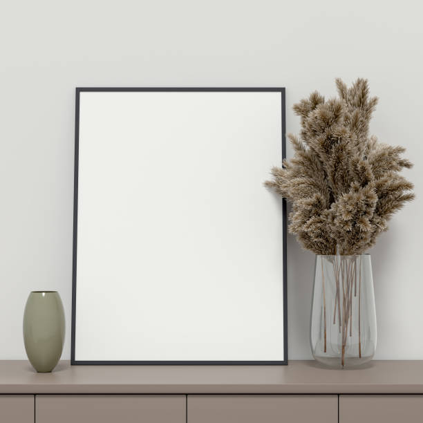 istock Blank picture frame for photographs, art, graphics with Leaves. Frame poster mockup template on the wall in home interior. 3D rendering 1442374483