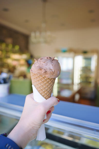 istock Asian holding homemade Greece ice cream 1442380115