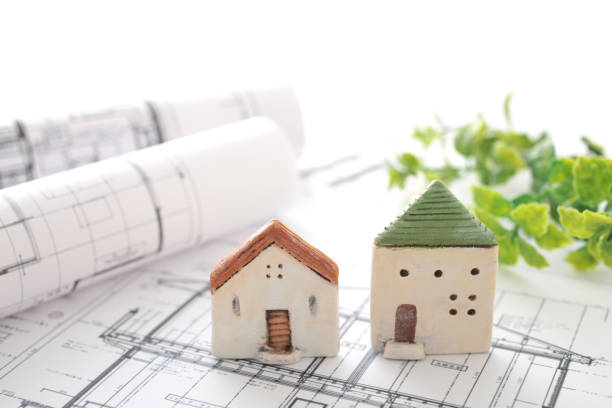 istock House model and blueprint image of my home 1442398836