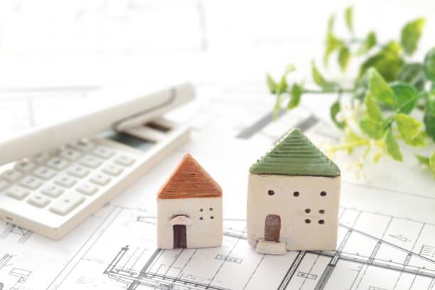istock House model and blueprint image of my home 1442398864