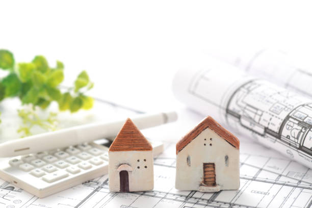 istock House model and blueprint image of my home 1442398869