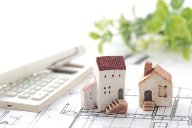 istock House model and blueprint image of my home 1442398871