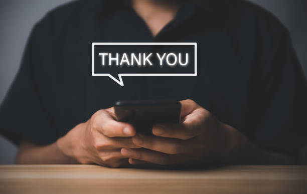istock Man touching smartphone and sending thank you. message letter writing congratulating, admire 1442400375