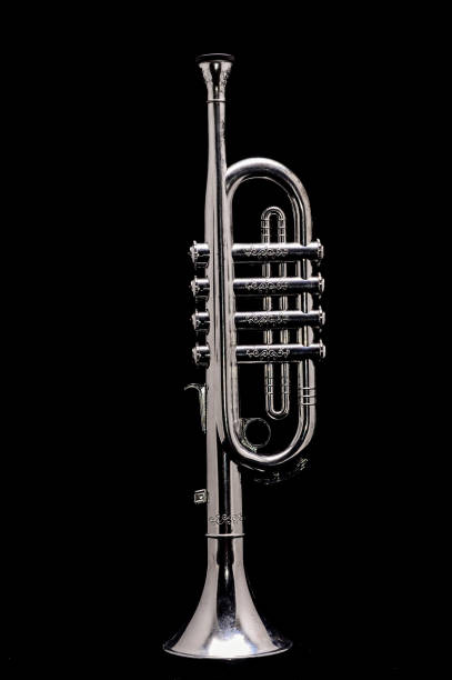 istock Vertical shot of a silver Trumpet isolated on a black background 1442404367