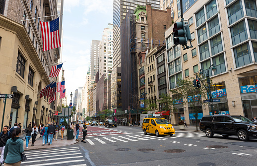 New York, USA - September 23, 2018: Fifth Avenue (5th Ave) is the most famous street of New York. 5th AVE is best known as an unrivaled shopping street. Manhattan, New York City, USA.
