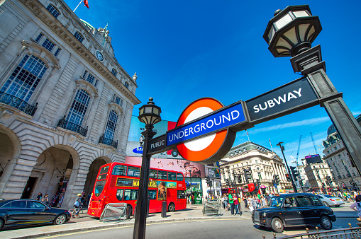 london, United Kingdom – June 30, 2015: A perspective shot of Red Double Decker bus speeds up in Piccadilly Circus
