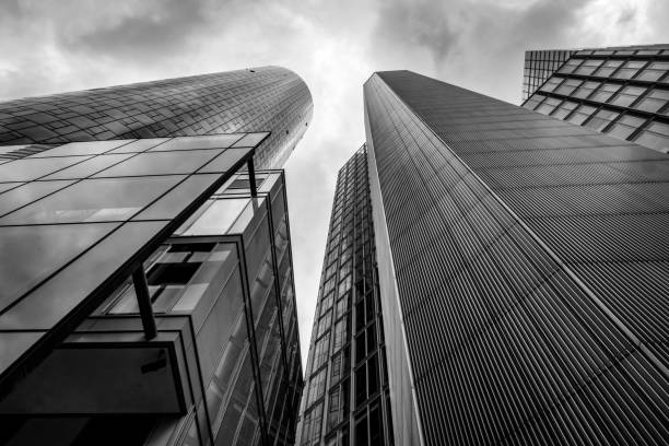 istock low angle view of office buildings against cloudy sky 1442411830