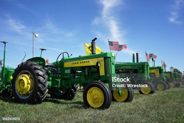 John Deere Vintage Classic Tractor Show With Us Flags Stock Photo - Download Image Now