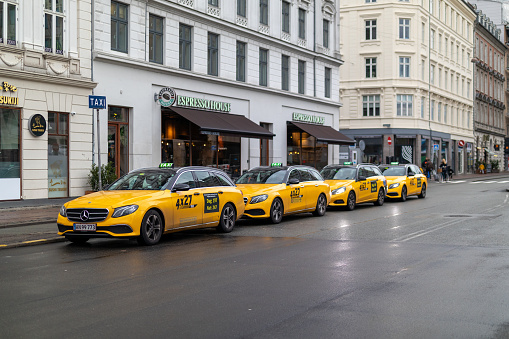 Copenhagen, Denmark – October 09, 2020: The taxis queuing in the city center of Copenhagen. Denmark.