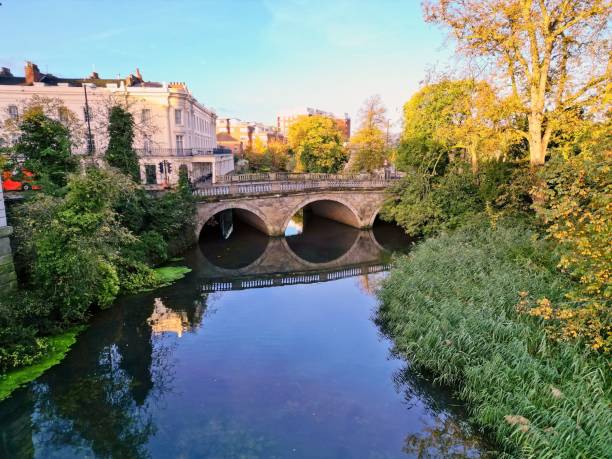 istock Stone bridge over the River Leam in Leamington Spa, Warwickshire on a sunny day 1442416451