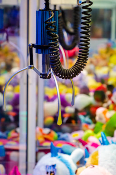 istock A claw crane game machine with toys 1442417371