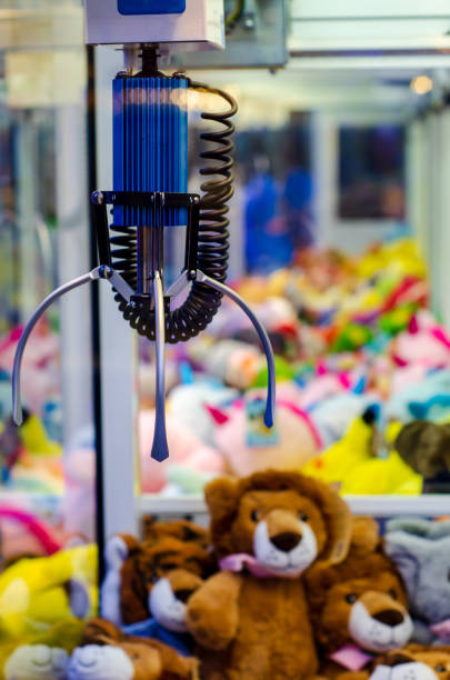 istock A claw crane game machine with toys 1442418299