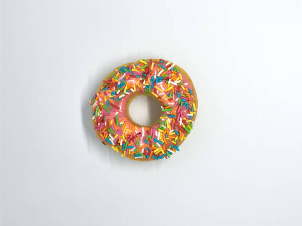 istock donut with colorful chocolate sprinkles 1442418837