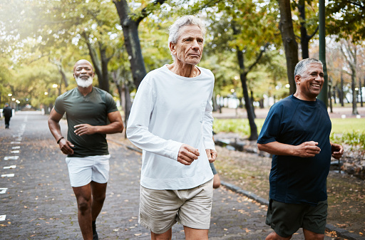 istock Run, group and senior men training, running and in street for health, wellness and fitness outdoor. Retirement, healthy males and friends running together, strong workout and exercise for cardio 1442424420
