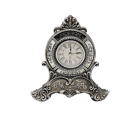 A vintage silver clock isolated on a white background