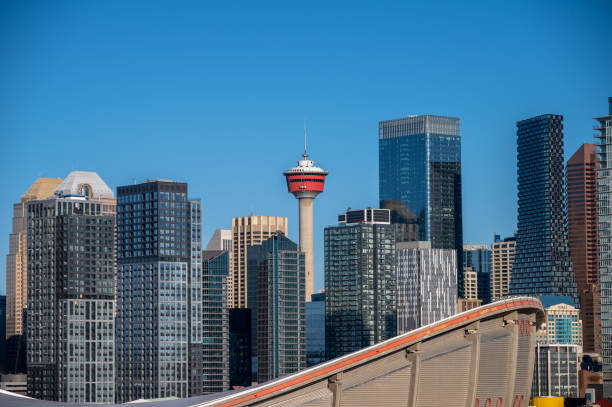 istock View of the Calgary Tower with modern skyscrapers under the blue sky,  Alberta, Canada 1442425381