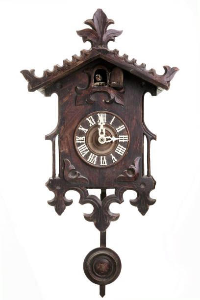 istock Vertical shot of a black forest cuckoo clock on white background 1442426646